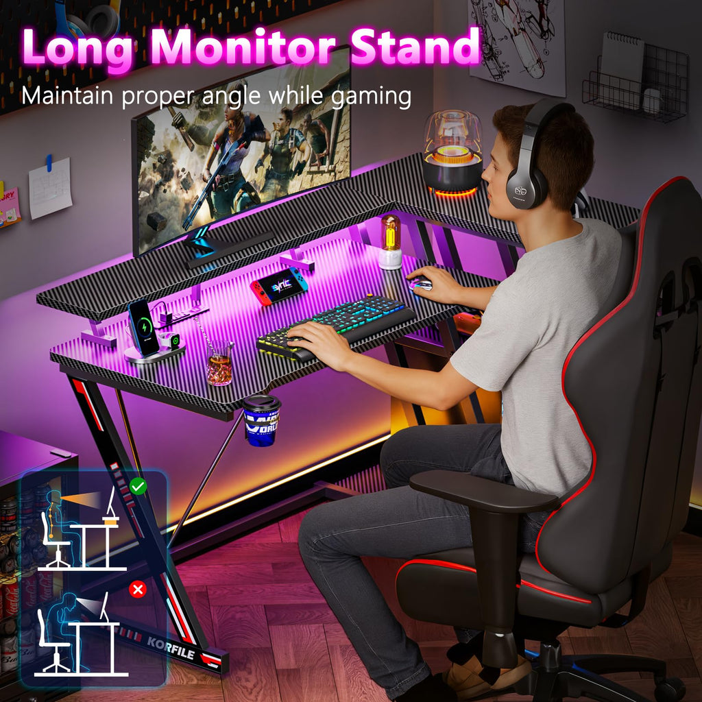 Korfile 40 Inch Gaming Desk with Power Outlet, LED, Carbon Fiber Black
